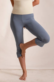 Dusty blue flared hem crop leggings with subtle side slit detail.