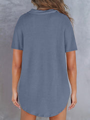 Dusty blue waffle knit polo shirt with short sleeves and button detail
