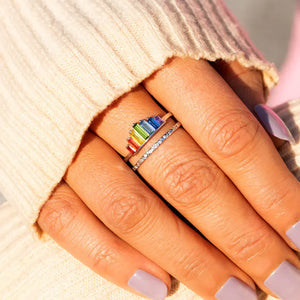 Rainbow prism stacked sterling ring set with colorful baguette stones and a pave band.