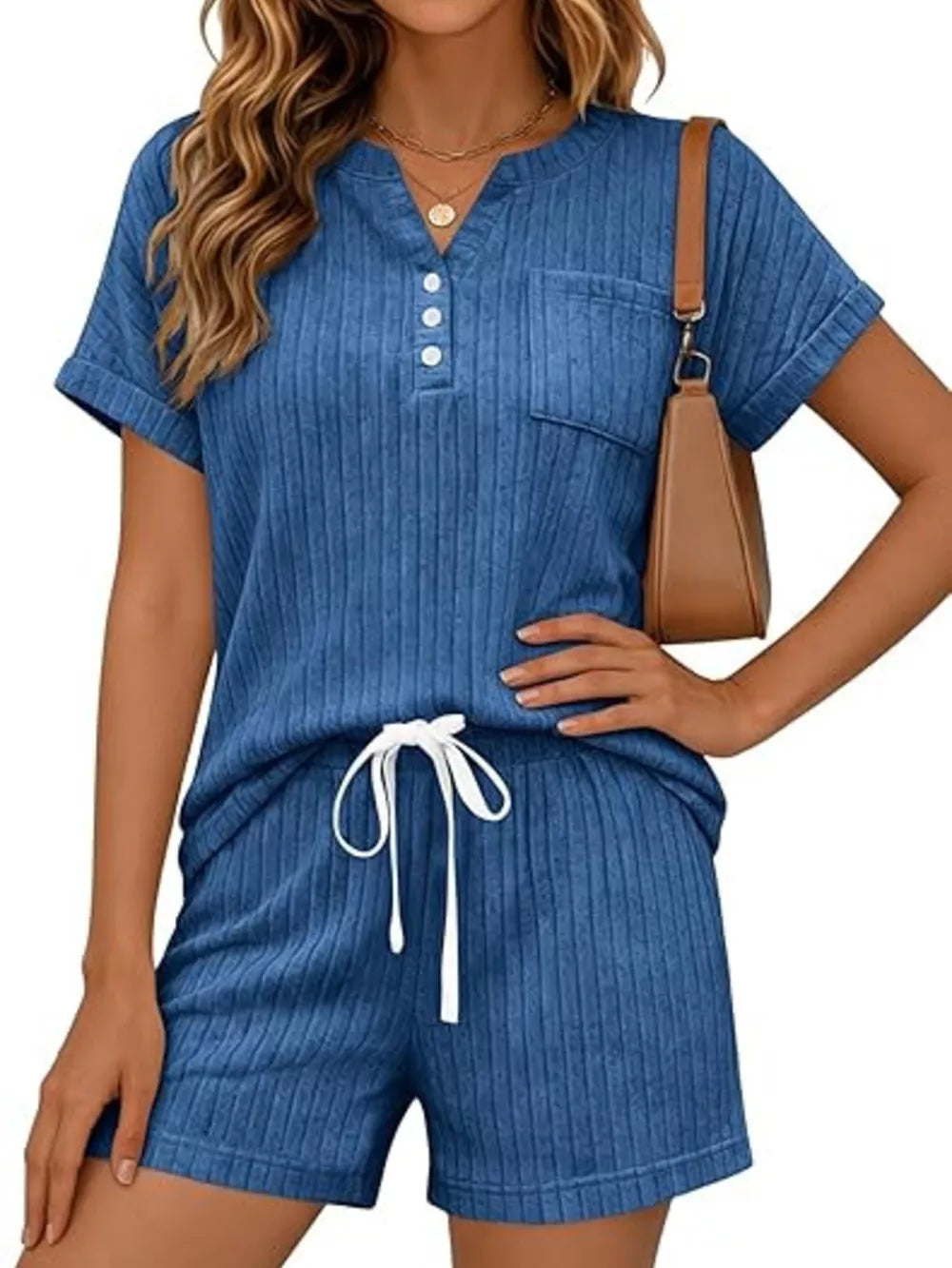 Blue ribbed knit loungewear set with henley neckline, pocket, and drawstring shorts.
