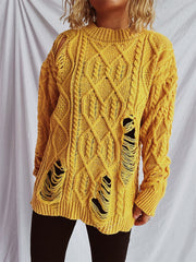 Mustard yellow distressed cable knit sweater with ripped details
