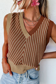 Chevron knit vest in brown and tan with a V-neck and open weave detail.
