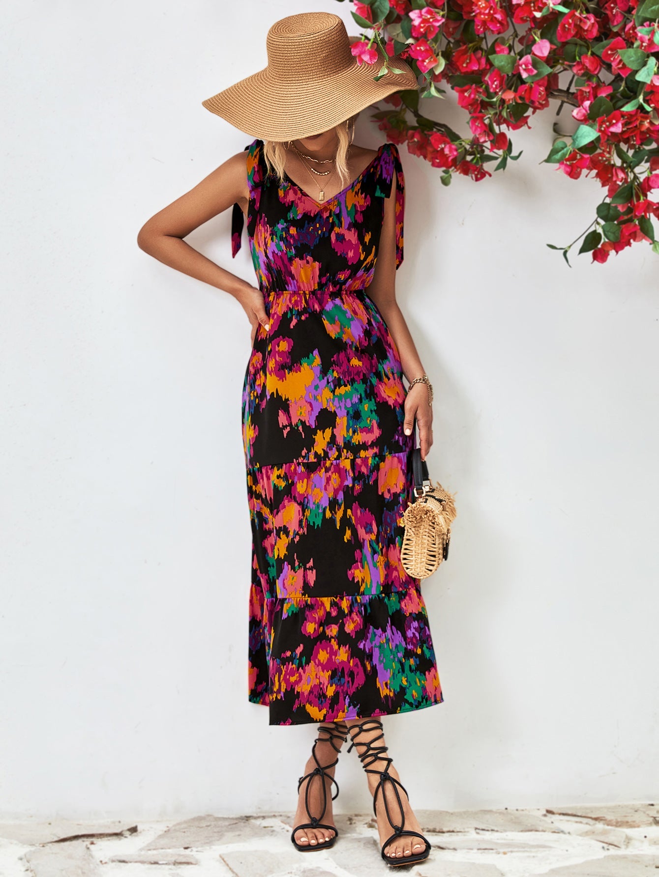 Tie-strap abstract print tiered maxi dress with a V-neck.