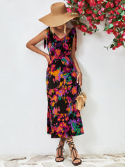 Tie-strap abstract print tiered maxi dress with a V-neck.