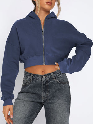 Navy cropped zip-up hoodie with ribbed hem and cuffs.