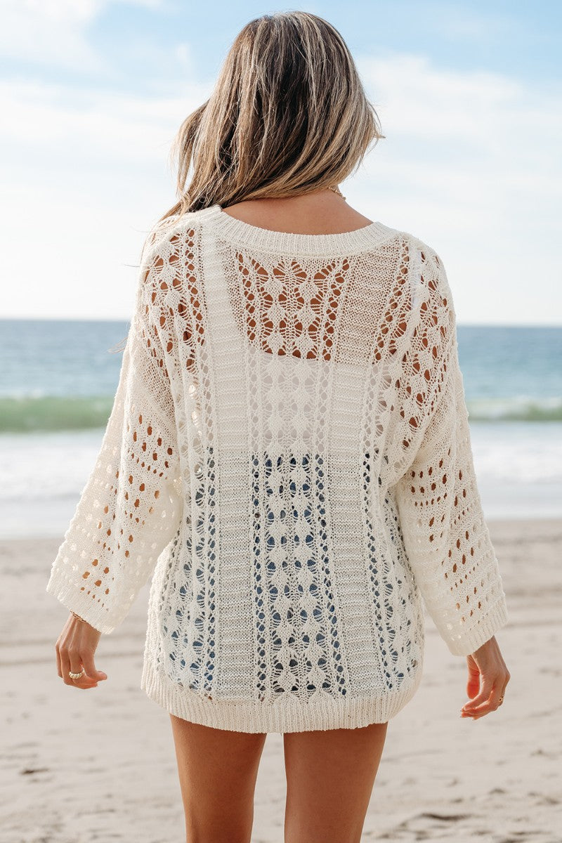 Beige openwork knit beach cover-up with intricate diamond pattern and relaxed fit.