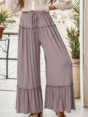 Mauve wide-leg pants with ruffle trim and drawstring waist