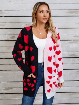 Heartbeat split-panel open cardigan in black and pink with red heart pattern, acrylic blend.