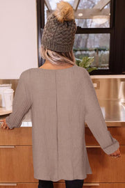 Waffle knit tunic in khaki with boat neck and long sleeves.