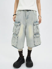 Men's light wash denim capri cargo pants with multiple pockets and a relaxed fit.