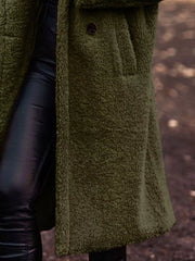 Army green teddy bear longline coat with button detail and pocket.
