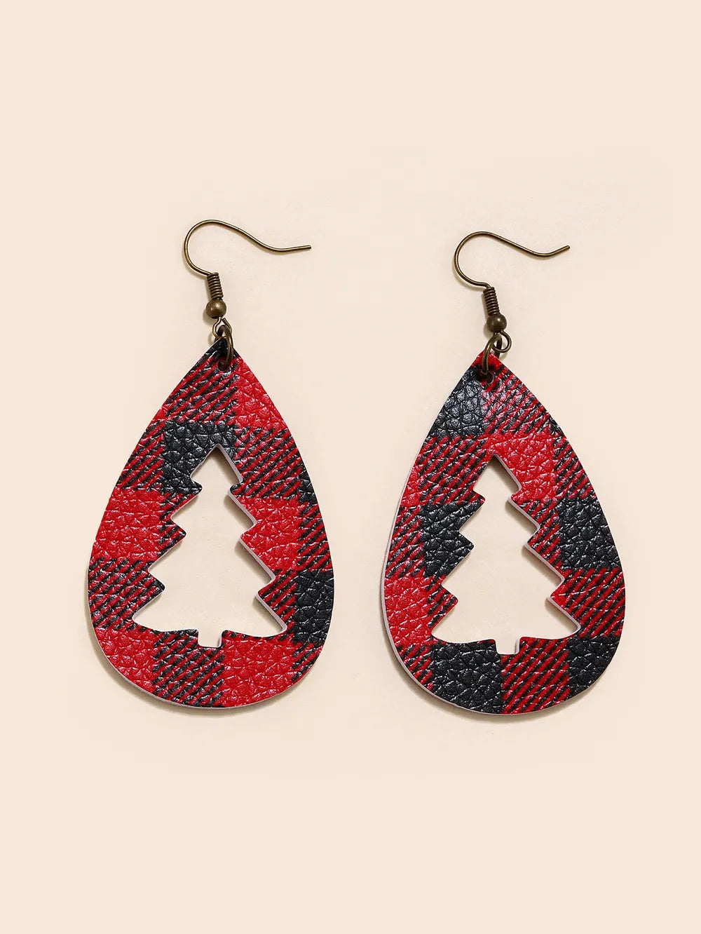 Plaid teardrop earrings with tree cutouts and bronze hooks.