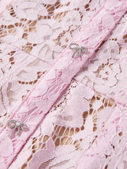 Powder pink lace mermaid dress with crystal bow details