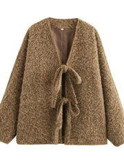 Textured knit tie-front cardigan in dark brown with a cozy, open front and tie closures.