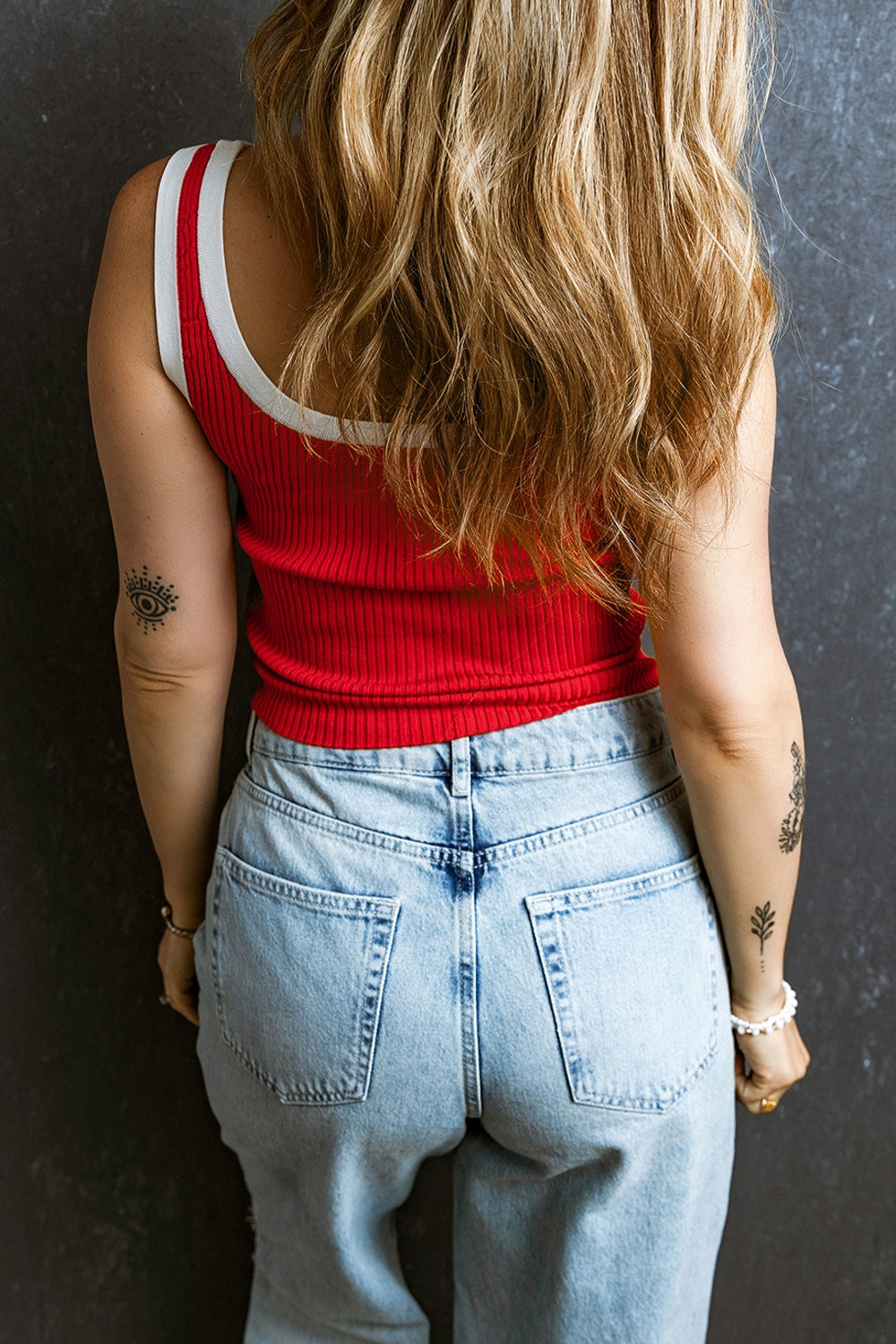 Scarlet ribbed tank top with white contrast trim neckline and armholes