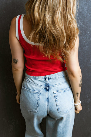 Scarlet ribbed tank top with white contrast trim neckline and armholes