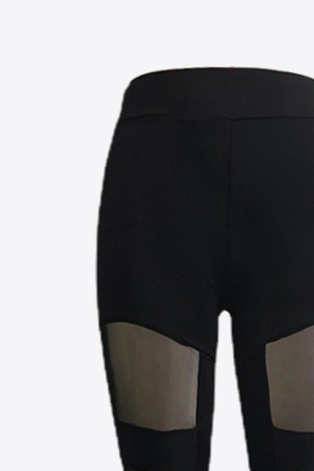 Black leggings with geometric mesh panels on the legs.