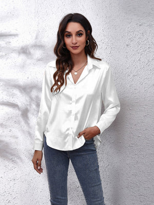 White satin collared button-down shirt with long sleeves and a relaxed fit.