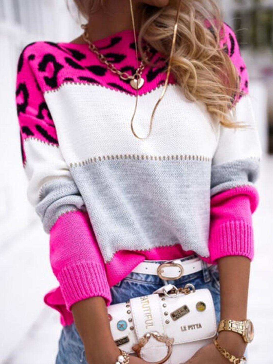 Leopard panel knit sweater in hot pink, white, and gray colorblock with crew neck.