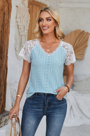 Aqua eyelet raglan blouse with white lace sleeves and V-neckline