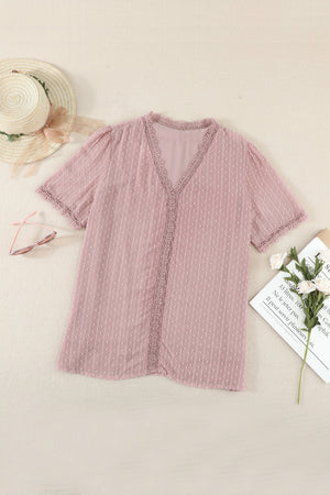 Dusty pink dotted Swiss lace trim blouse with V-neck and short sleeves.