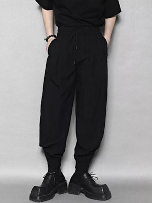 Black sweatpants with drawstring waist and ankle cuffs, men's casual comfort pants