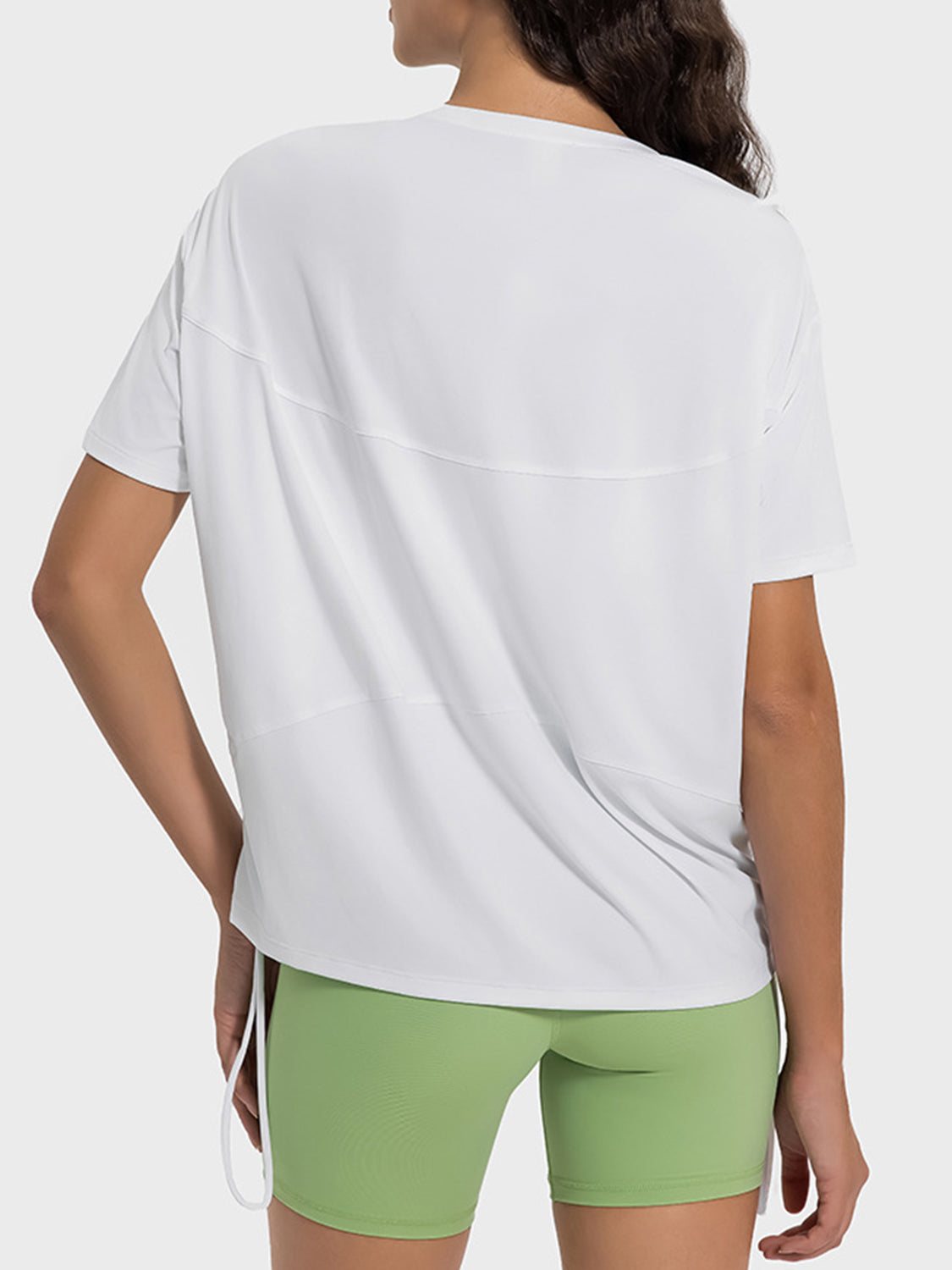 White sculpted jersey t-shirt with side tie detail and curved seams