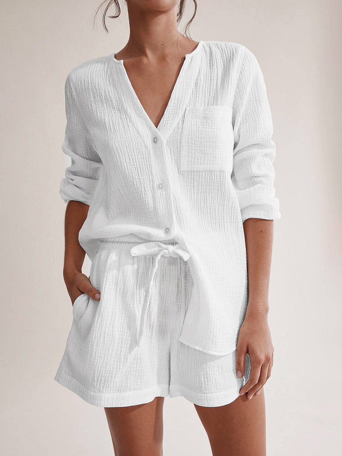 White textured cotton pajama set with button-up shirt and drawstring shorts