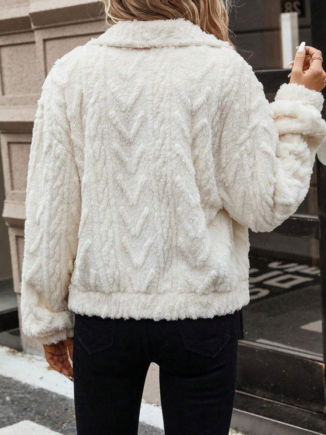 Ivory textured shearling-effect utility jacket with chevron pattern and collar.
