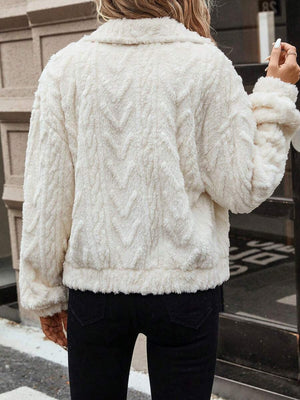 Ivory textured shearling-effect utility jacket with chevron pattern and collar.