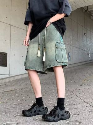 Vintage cargo denim shorts in Air Force Blue with braided drawstring and tassels.