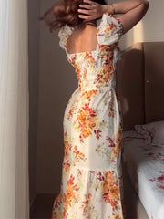 Floral tie-detail ruched waist dress with puff sleeves and tiered hem