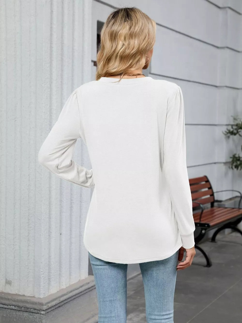 White V-neck long sleeve maternity t-shirt with a relaxed fit.