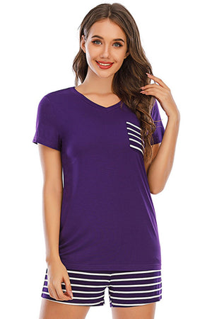 Violet V-neck lounge set with striped pocket detail and matching striped shorts.