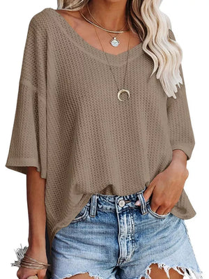 Waffle knit relaxed v-neck t-shirt in Khaki Color with 3/4 sleeves, styled with denim shorts.