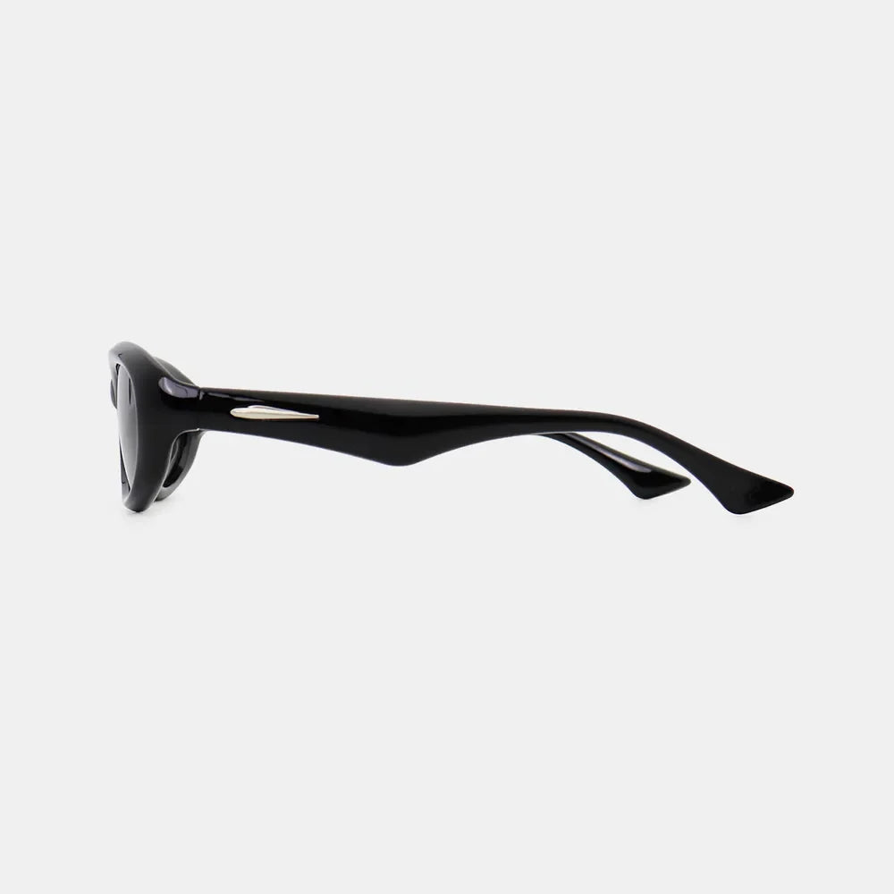 Black cat eye sunglasses with a chic, angular frame and silver accent.