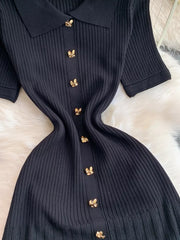 Black ribbed knit midi dress with collar and gold button detail