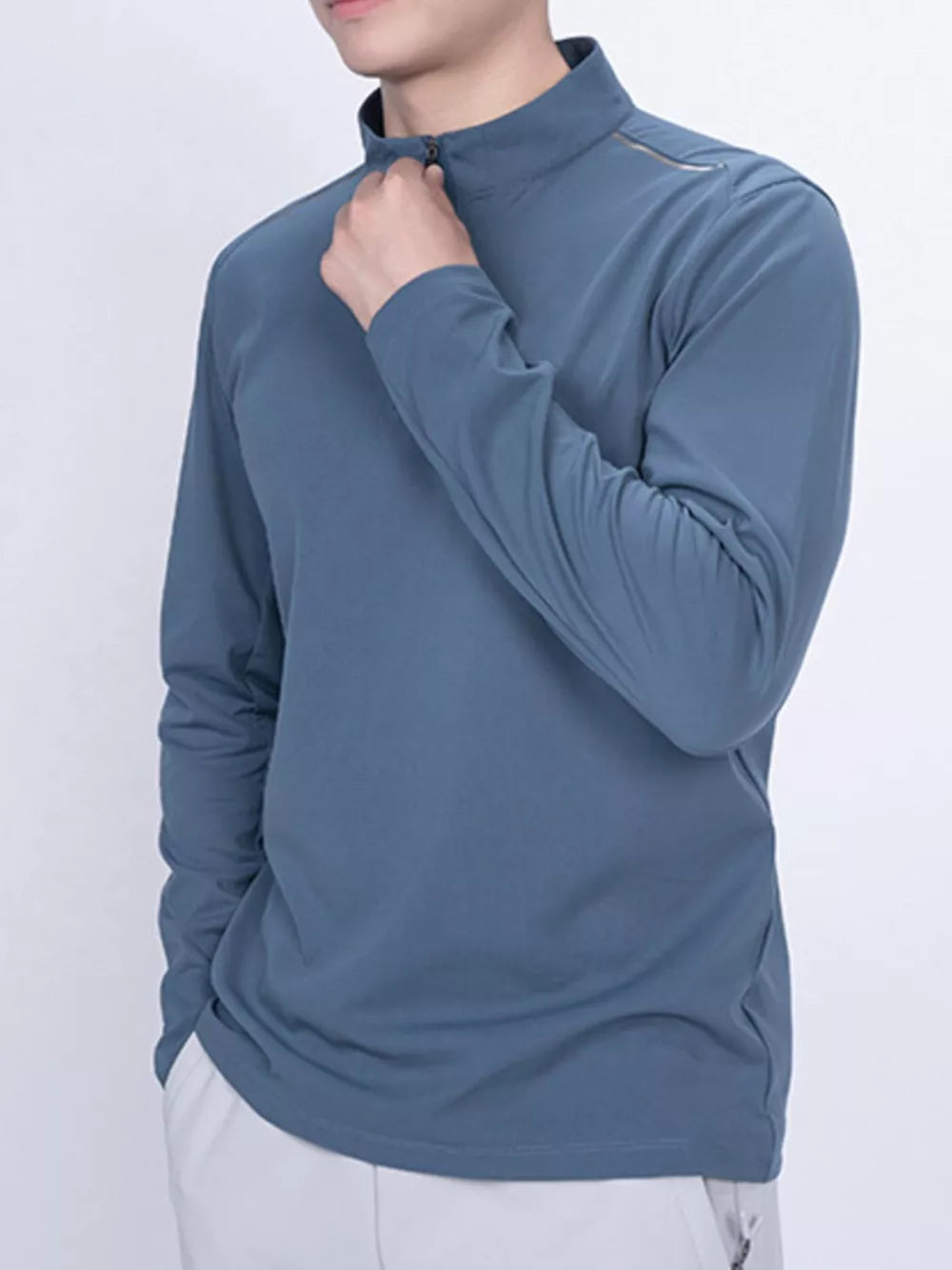 Men's Dusty Blue quarter-zip active t-shirt with a mock neck and zip detail.