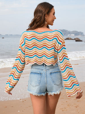 Cropped crochet sweater with multicolor wave stripes and open knit detail.