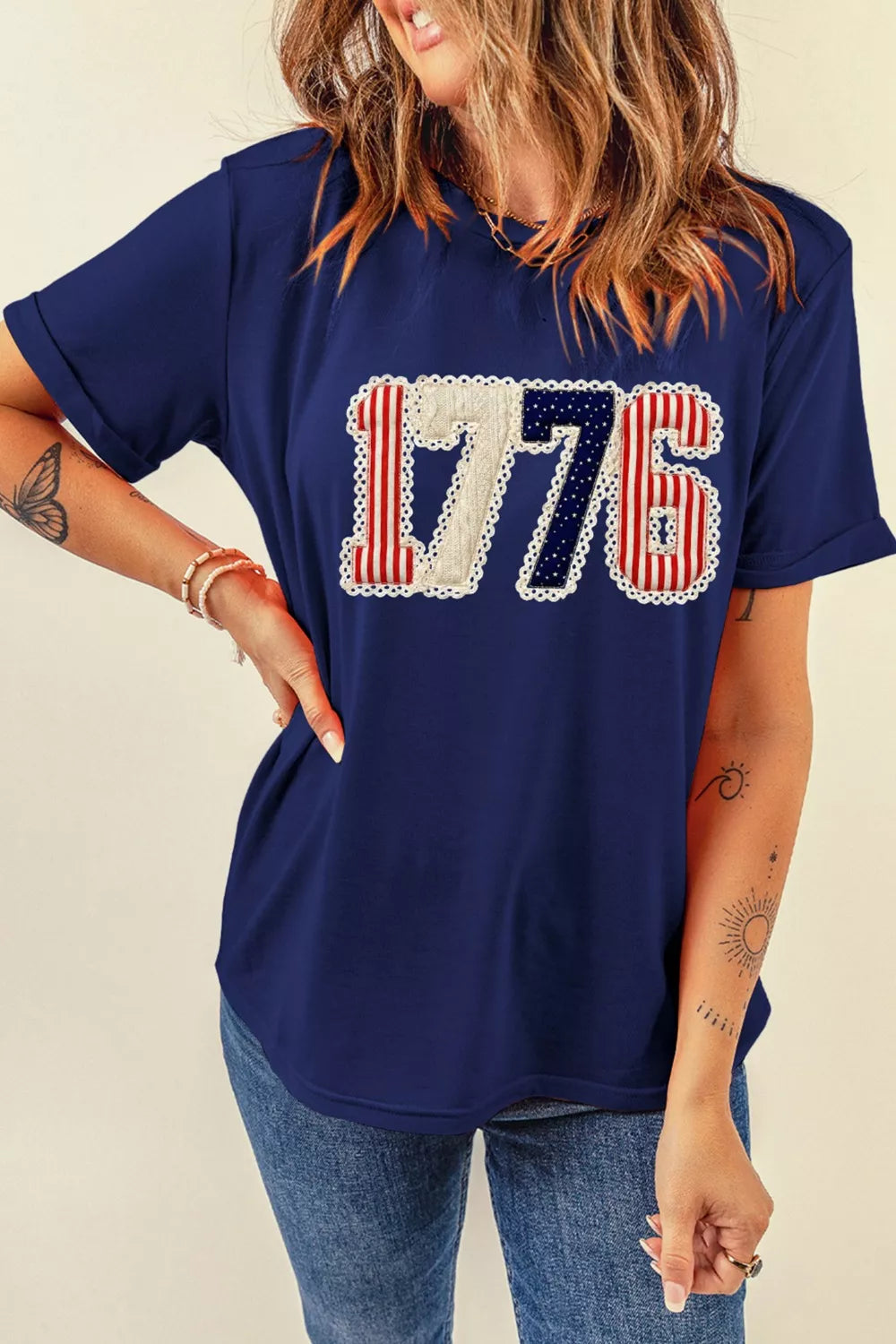 Navy cotton maternity t-shirt with patriotic 1776 appliqué and lace trim.