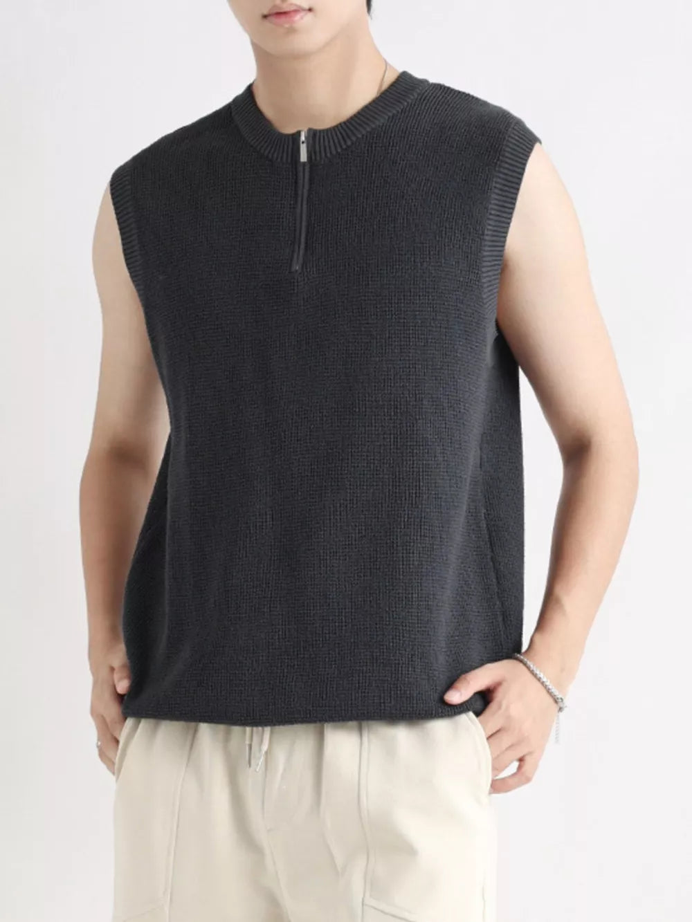 Men's dark gray textured knit quarter-zip tank top with a mock neck.