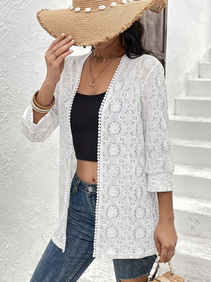 White floral lace open-front duster with pom-pom trim and 3/4 sleeves.