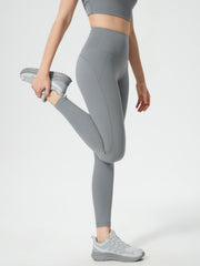 Gray sculpted contour leggings with pocket detail and a high waist.