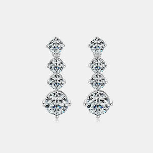 Silver cascade drop earrings with cubic zirconia stones.