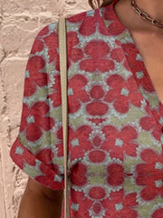 Americana Henley top in Burgundy with a floral print and cuffed short sleeves.