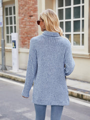 Misty Blue ribbed turtleneck sweater with side slits and long sleeves.