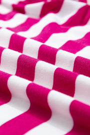 Striped tee with flutter sleeves and contrast trim in pink and white stripes.