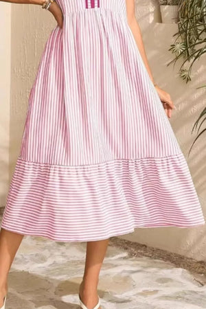 Blush pink striped midi dress with ruffle hem and sleeves.