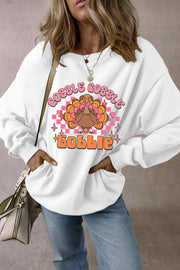 White graphic sweatshirt with retro turkey and "Gobble Gobble" text, crew neck, long sleeves.