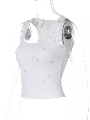 White cropped tank top with square neck and scattered rhinestone embellishments.